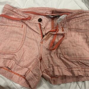 Orange women’s north face shorts size 6